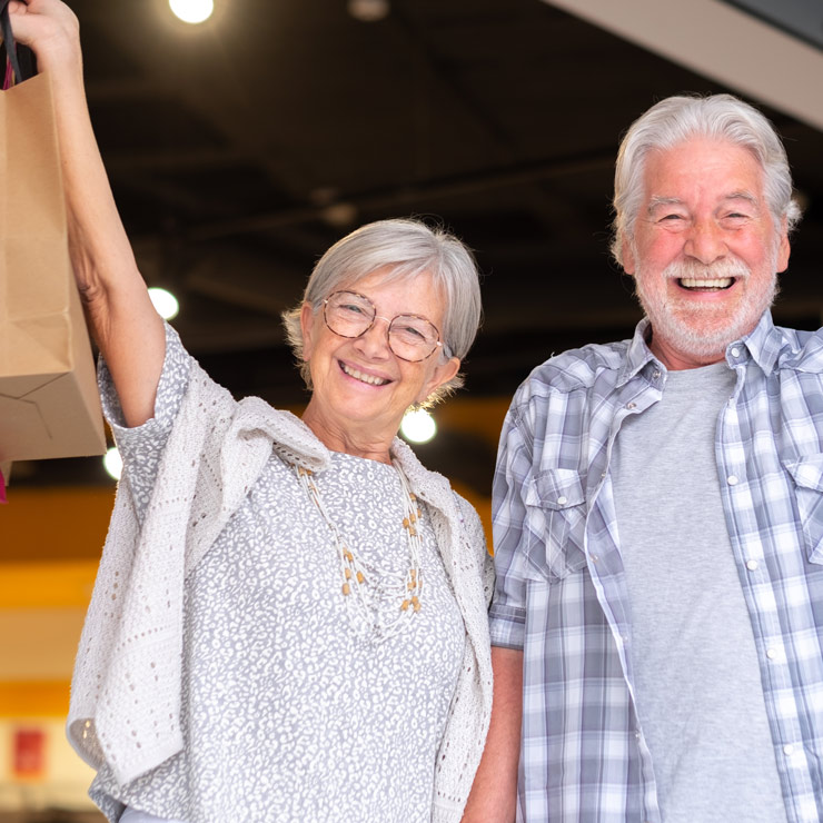 cheerful-caucasian-senior-couple-carrying-shopping-2024-11-02-23-13-22-utc